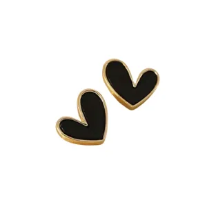 Black and gold heart studs. Dainty heart earrings. Girls heart studs. Women's heart studs. Cute heart studs. Gift for her. Women's jewelry. Minimalist jewelry. Girls jewelry.