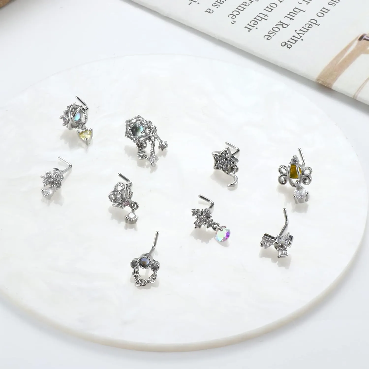 JOERICA 9 Pcs 20G Dangle Nose Rings and Studs for Women - Stainless Steel L Shaped Heart Moon Feather Snowflake Wing CZ Dangling Piercing Jewelry